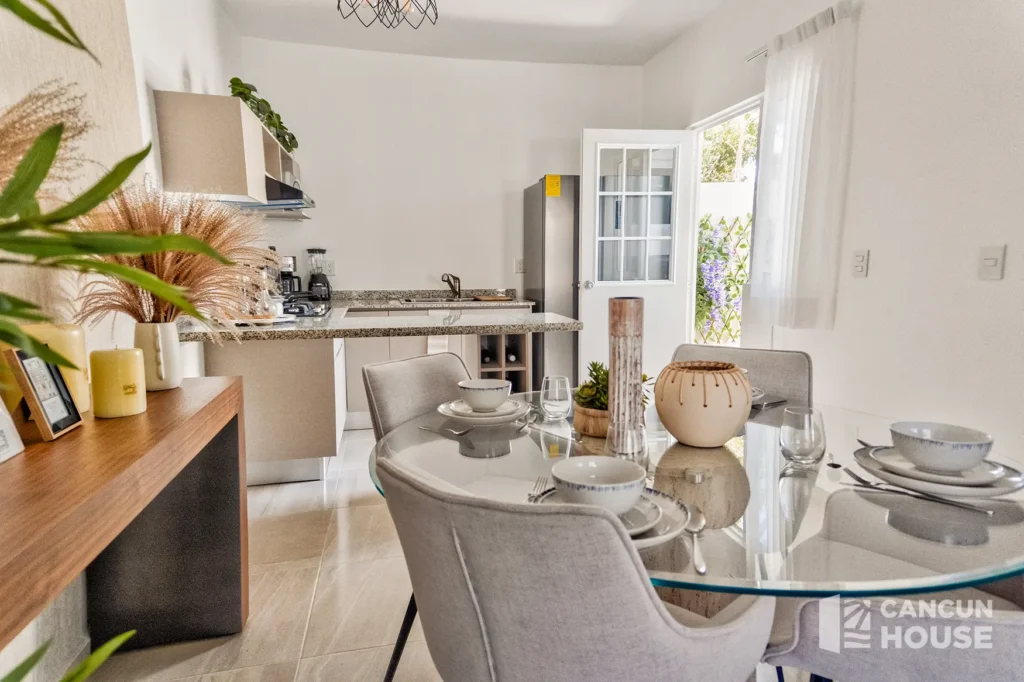 Dining room area in a Kitam Mayakoba house for sale.